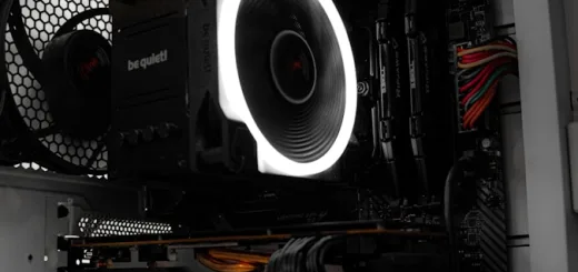 A close up of a computer case with a fan