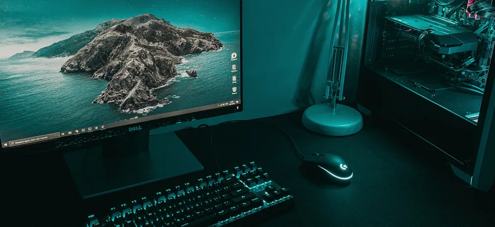 black flat screen computer monitor beside black computer keyboard