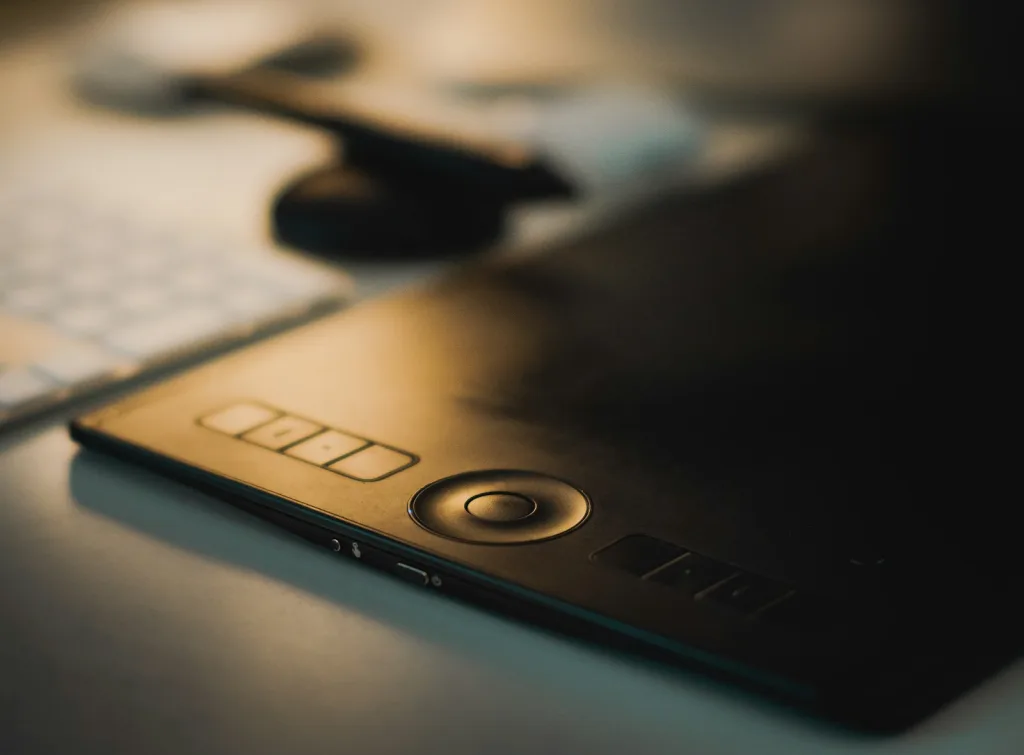 a close up of a cell phone on a desk