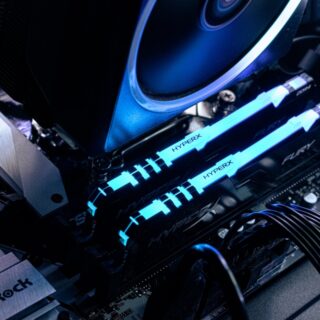 a close up of a computer motherboard with blue lights