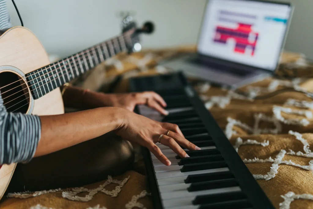 person playing black and white piano