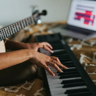 person playing black and white piano